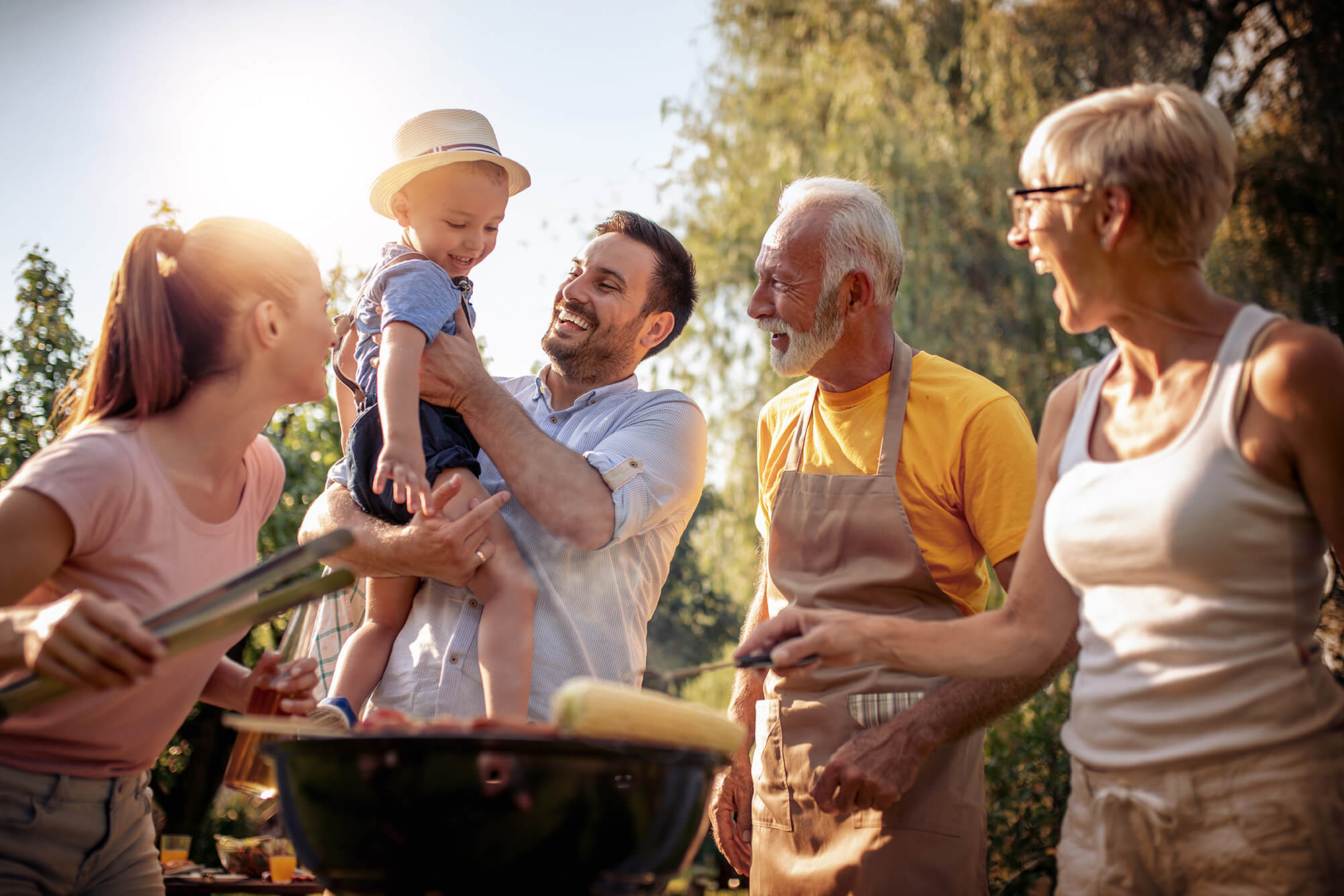 Happy family outdoor BBQ